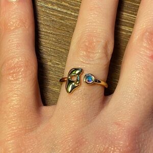 Gold masquerade mask ring with gem